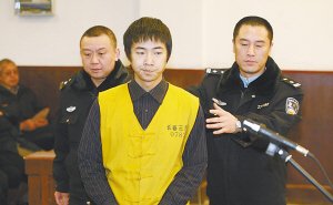 审判庭上,郭力维面无表情■胡春晓 张玉卓 王旭东 记者 王海涛